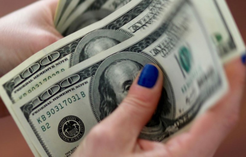 Dólar cai para R$ 5,56 com ambiente externo positivo