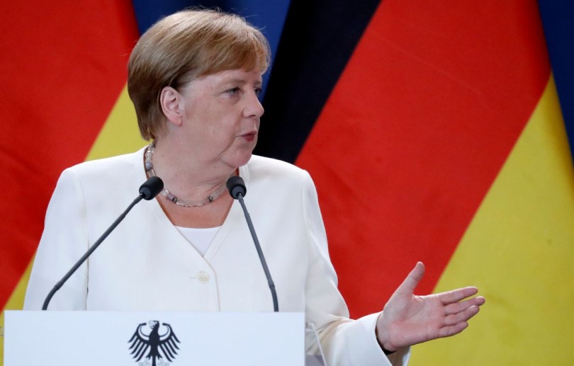 Símbolo da moderação, era Merkel se encerra com eleição apertada